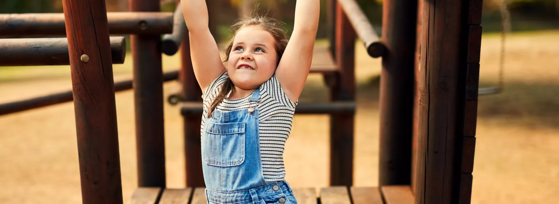 girl on monkey bars